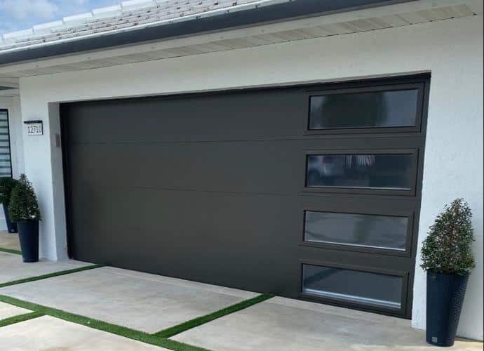 Mocha brown frame glass garage door by Access Doors & Windows