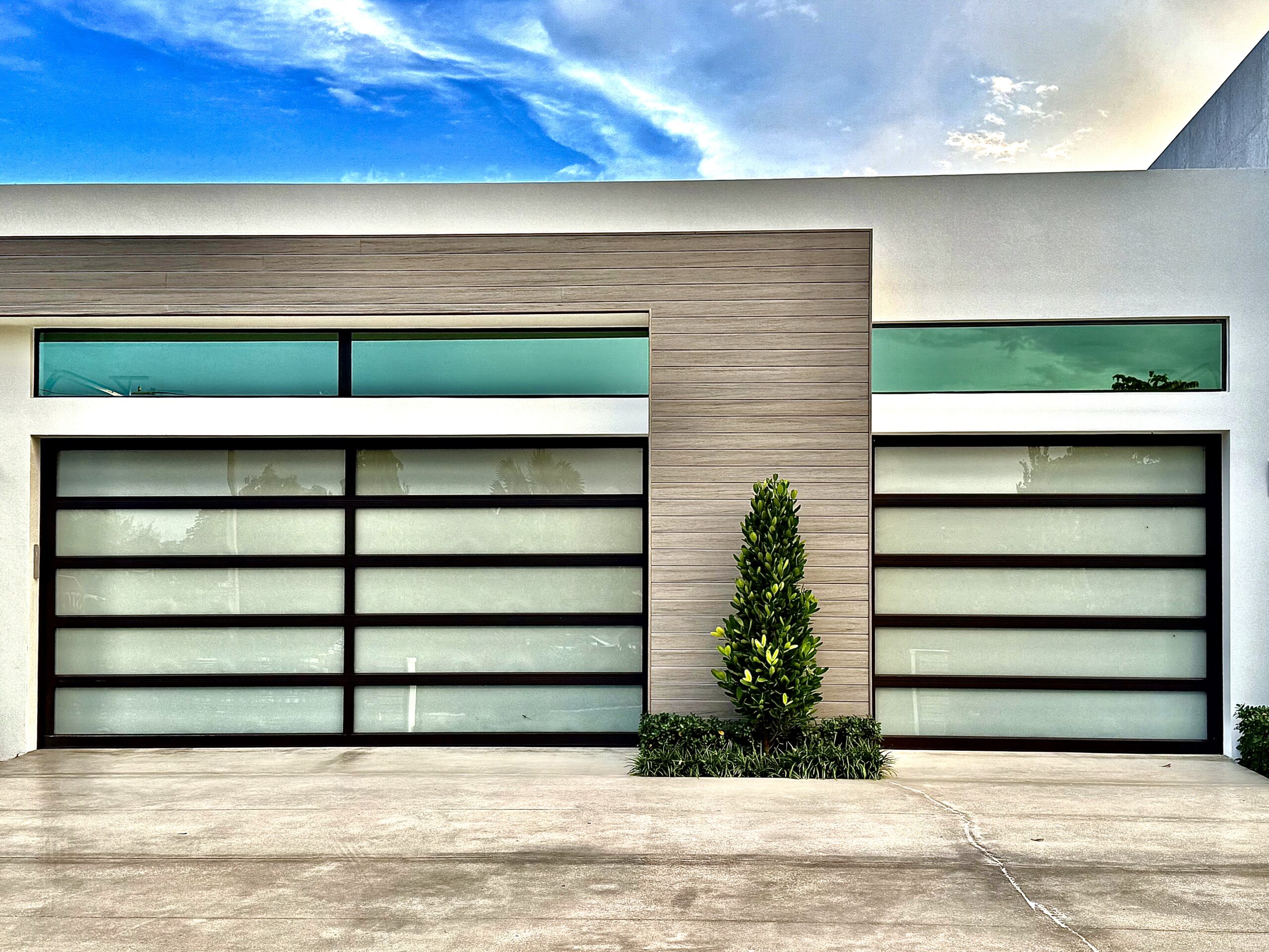 Premium glass garage door installation in Boca Raton