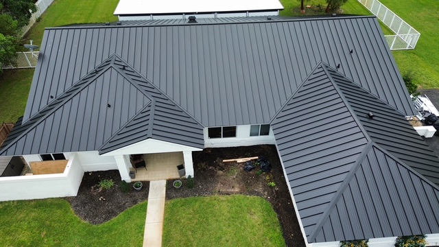 Standing-seam metal roof by Access Impact by Access Impact