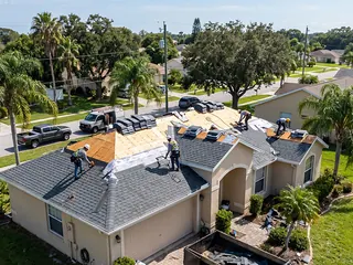 Our crew tearing off an old roof